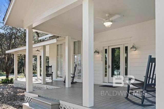 deck featuring ceiling fan and covered porch