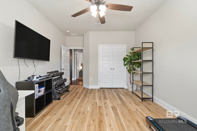 office space with hardwood / wood-style floors and ceiling fan