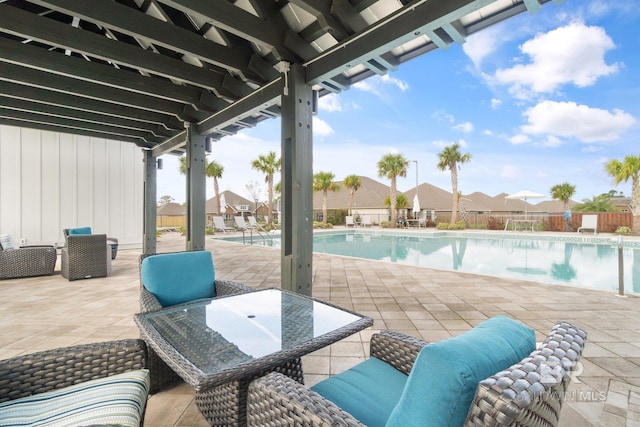 view of patio featuring a community pool