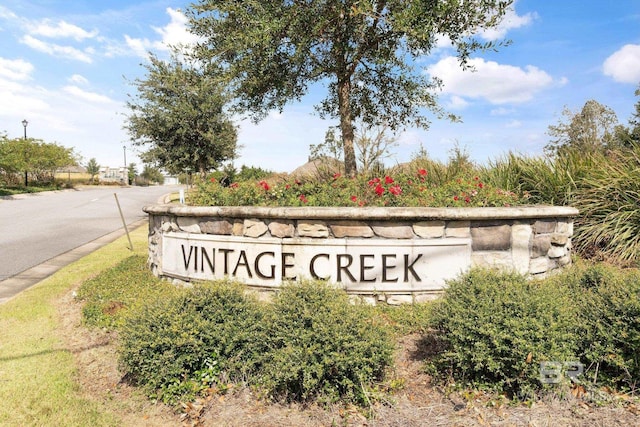 view of community sign