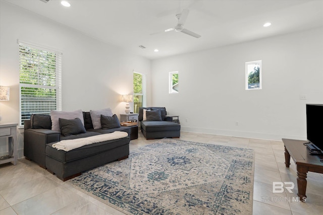 living room featuring ceiling fan, a wealth of natural light, visible vents, and recessed lighting