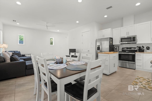 dining area featuring a ceiling fan, light tile patterned flooring, visible vents, and recessed lighting