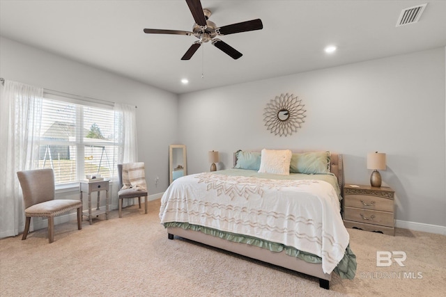 carpeted bedroom featuring ceiling fan