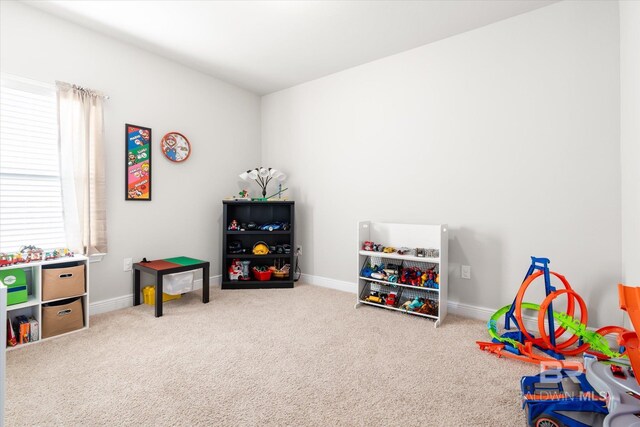 recreation room featuring carpet flooring