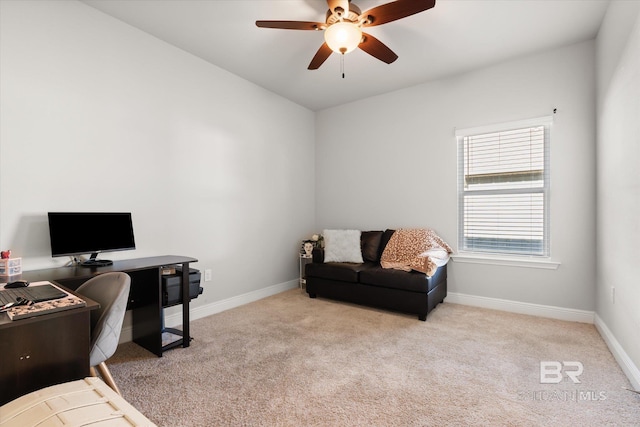 office space featuring ceiling fan and light colored carpet