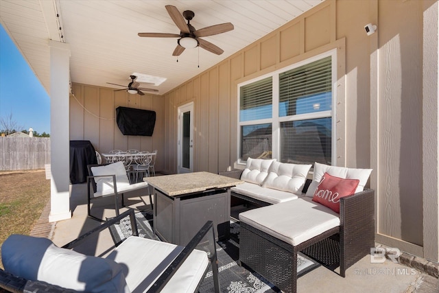 view of patio with ceiling fan and an outdoor hangout area