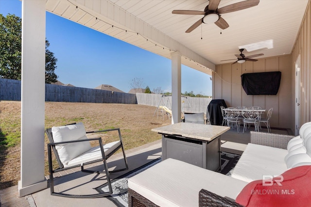 view of patio / terrace featuring ceiling fan and outdoor lounge area