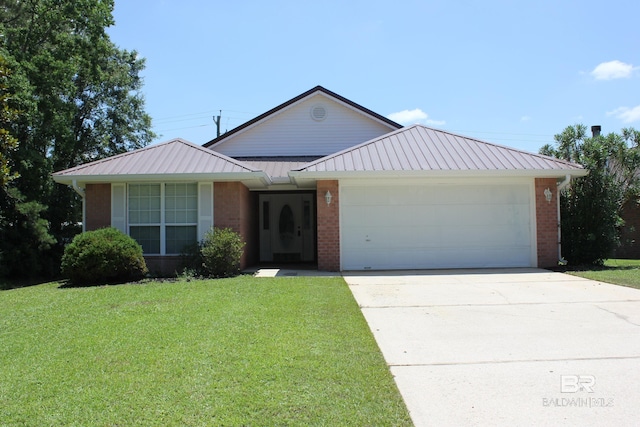 single story home featuring a garage and a front yard