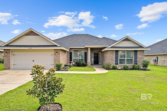 craftsman inspired home with a front yard and a garage