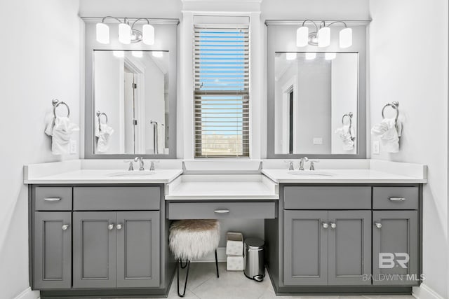 bathroom with vanity and tile patterned flooring