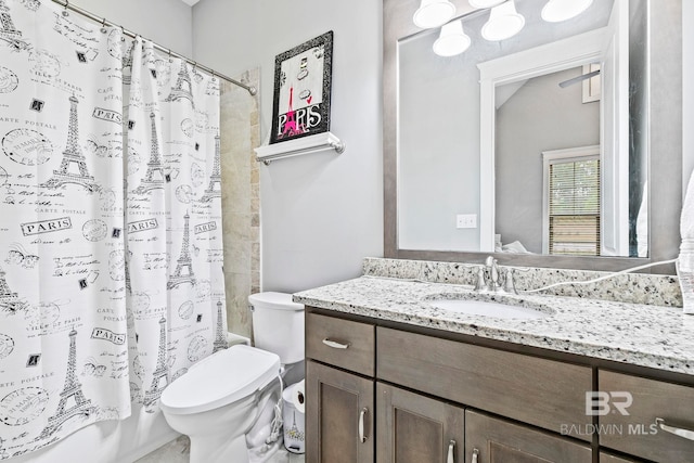 full bathroom featuring vanity, toilet, shower / bathtub combination with curtain, and vaulted ceiling