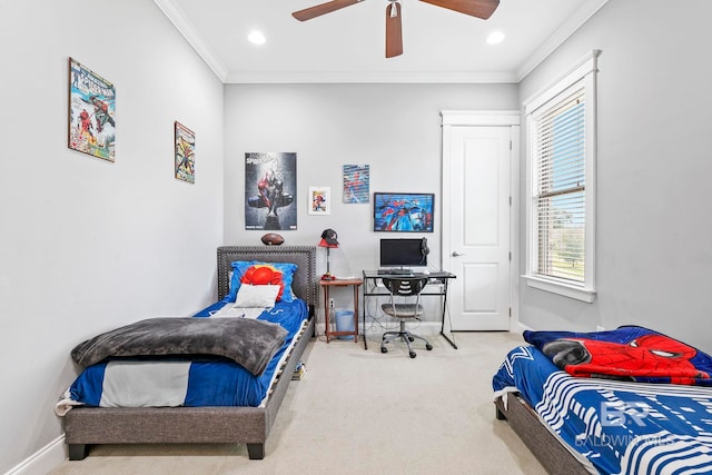 bedroom with carpet flooring, ornamental molding, and ceiling fan