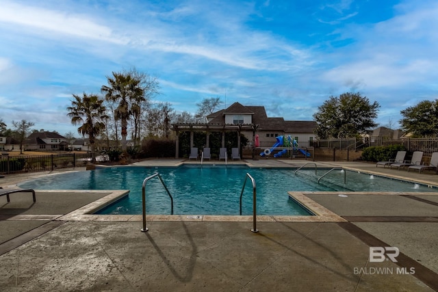 view of pool featuring a patio area