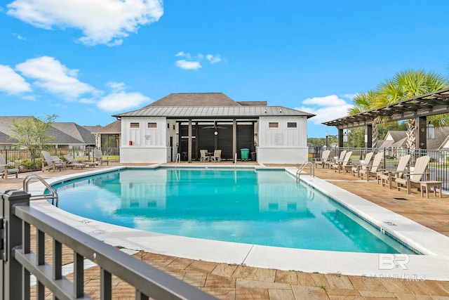 view of swimming pool with a patio area