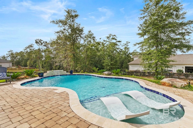 view of pool with a patio area