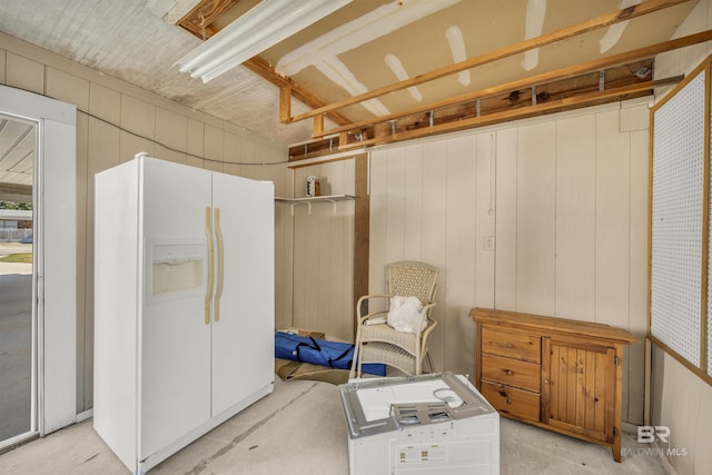 interior space featuring wood walls