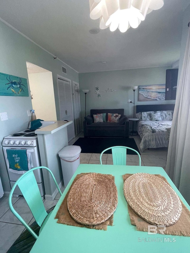 dining room featuring visible vents