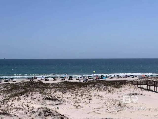 view of water feature with a beach view