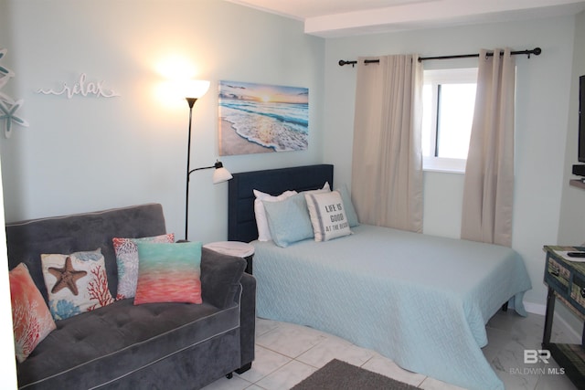 bedroom featuring tile patterned flooring