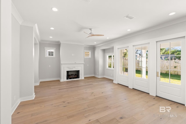 856 Geranium Dr, Fairhope, AL 36532 - unfurnished living room with crown molding, light wood finished floors, recessed lighting, a ceiling fan, and baseboards