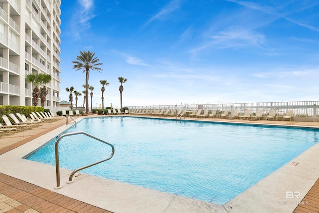 view of pool featuring a patio area