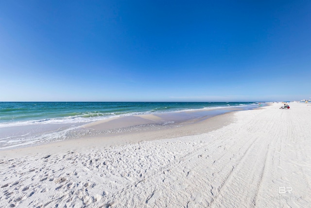 property view of water featuring a view of the beach