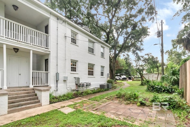 exterior space featuring central AC unit