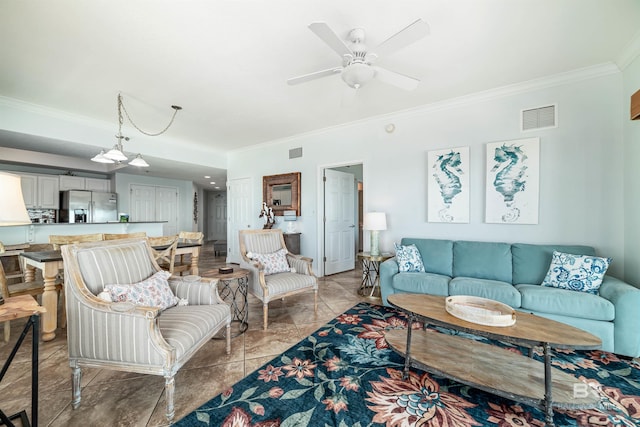 931 W Beach Blvd Unit 608, Gulf Shores, AL 36542 - living room featuring crown molding, a ceiling fan, and light marble finish floors