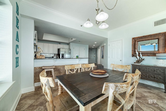 931 W Beach Blvd Unit 608, Gulf Shores, AL 36542 - dining room with ornamental molding, a chandelier, baseboards, and stone tile flooring