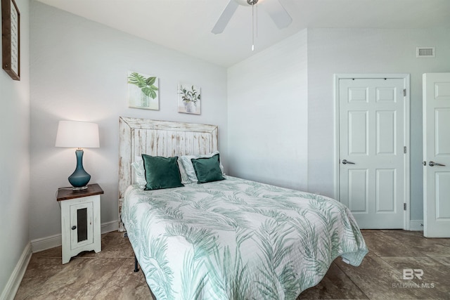 931 W Beach Blvd Unit 608, Gulf Shores, AL 36542 - bedroom with baseboards and ceiling fan