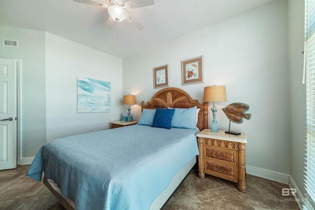 931 W Beach Blvd Unit 608, Gulf Shores, AL 36542 - bedroom featuring baseboards, a ceiling fan, and dark tile patterned flooring