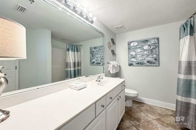 931 W Beach Blvd Unit 608, Gulf Shores, AL 36542 - bathroom with toilet, vanity, tile patterned flooring, baseboards, and a shower with shower curtain