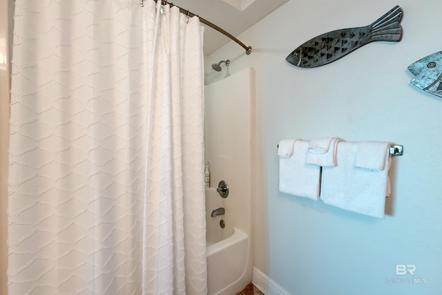 931 W Beach Blvd Unit 608, Gulf Shores, AL 36542 - bathroom featuring shower / tub combo and baseboards