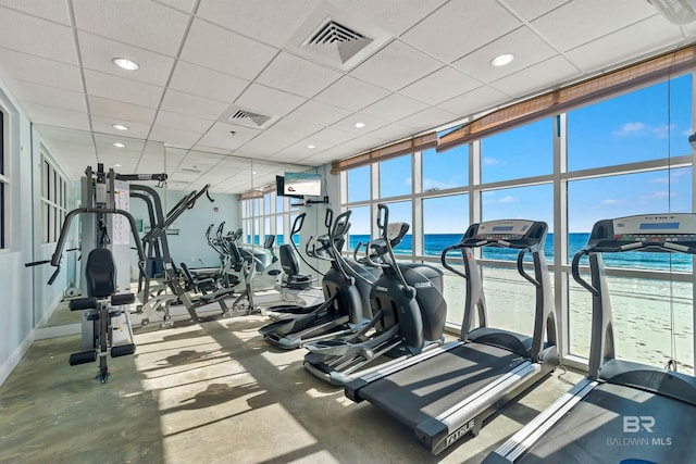 931 W Beach Blvd Unit 608, Gulf Shores, AL 36542 - gym featuring a paneled ceiling, baseboards, and recessed lighting