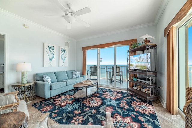 931 W Beach Blvd Unit 608, Gulf Shores, AL 36542 - tiled living room with ornamental molding and ceiling fan