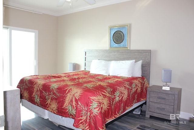 bedroom featuring crown molding, ceiling fan, and dark hardwood / wood-style flooring