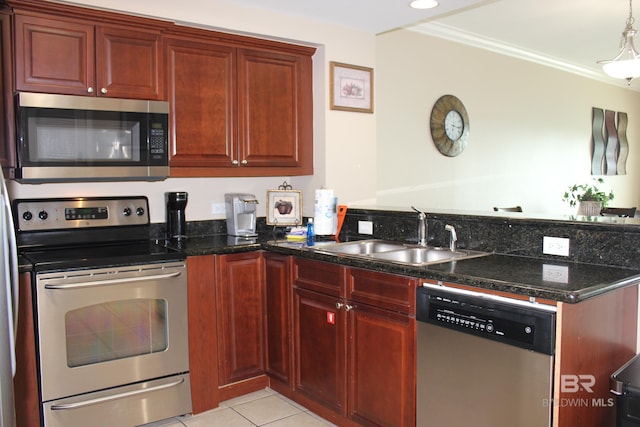 kitchen with stainless steel appliances, dark stone counters, sink, crown molding, and light tile patterned flooring