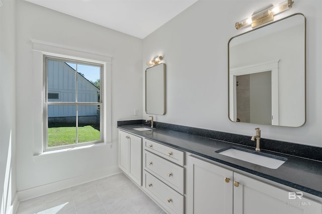 bathroom with vanity and tile patterned floors