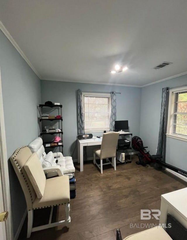 home office featuring ornamental molding and dark hardwood / wood-style floors