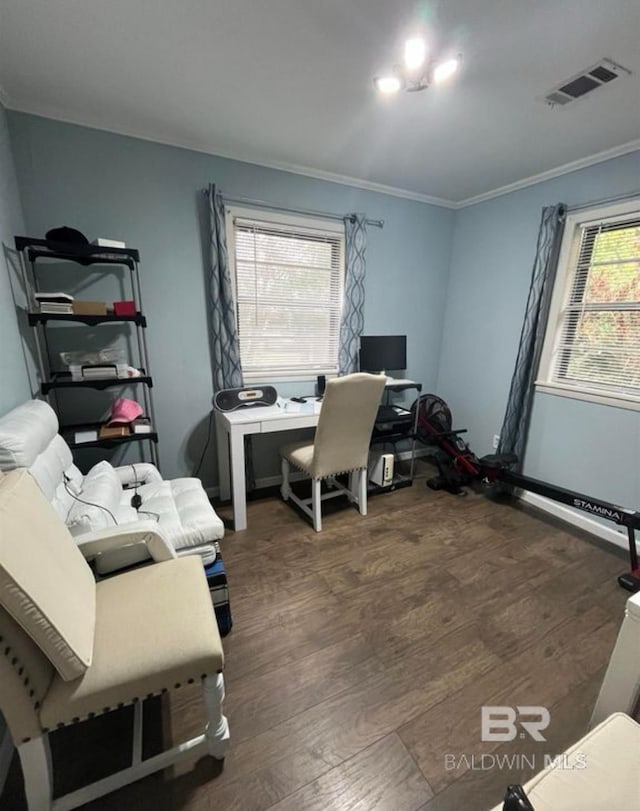 home office featuring ornamental molding and dark hardwood / wood-style flooring