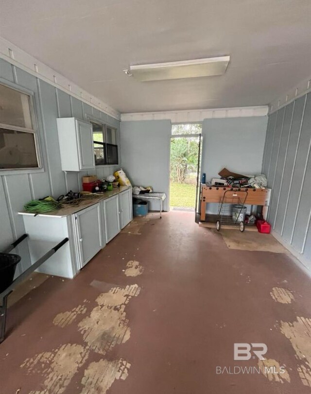 interior space featuring concrete flooring