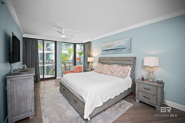bedroom with ornamental molding, access to outside, baseboards, wood finished floors, and ceiling fan