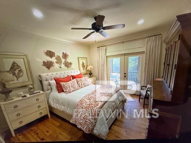 bedroom with ceiling fan, french doors, wood finished floors, and access to outside