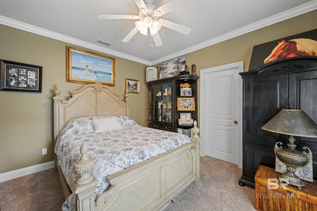 carpeted bedroom featuring crown molding and ceiling fan