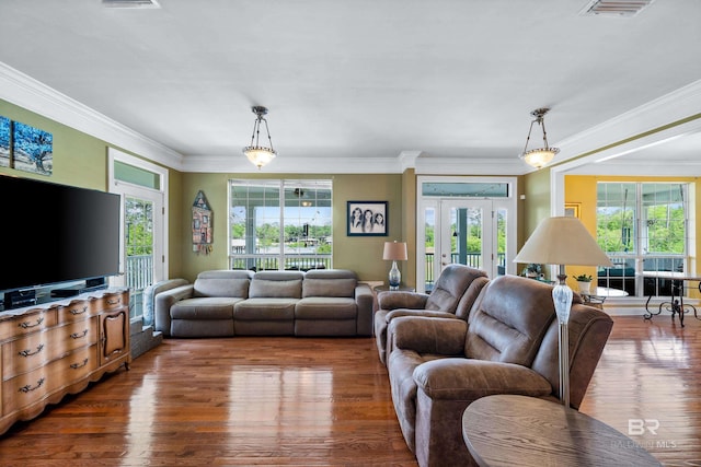 16288 Ferry Rd, Fairhope, AL 36532 - living room with ornamental molding, wood finished floors, and a wealth of natural light