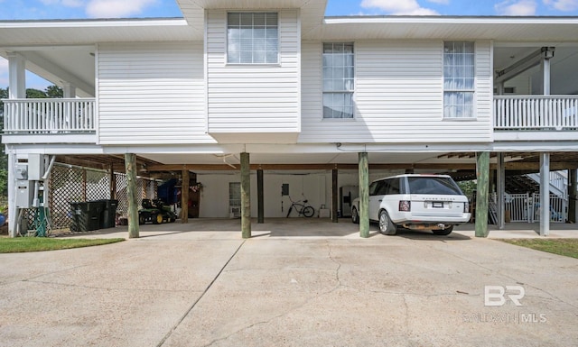 16288 Ferry Rd, Fairhope, AL 36532 - townhome / multi-family property with driveway and a carport