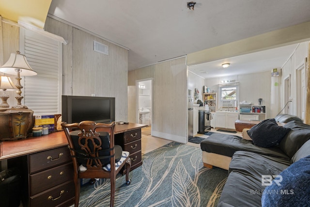 office area with sink and light tile patterned floors