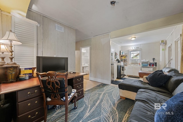 16288 Ferry Rd, Fairhope, AL 36532 - living room with visible vents, carpet flooring, and wooden walls
