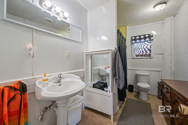 bathroom with a shower with curtain and toilet