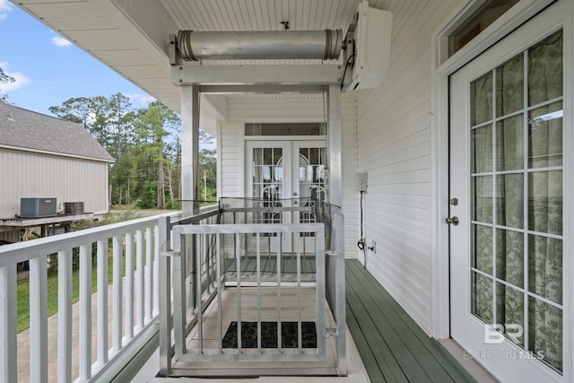 balcony featuring central air condition unit